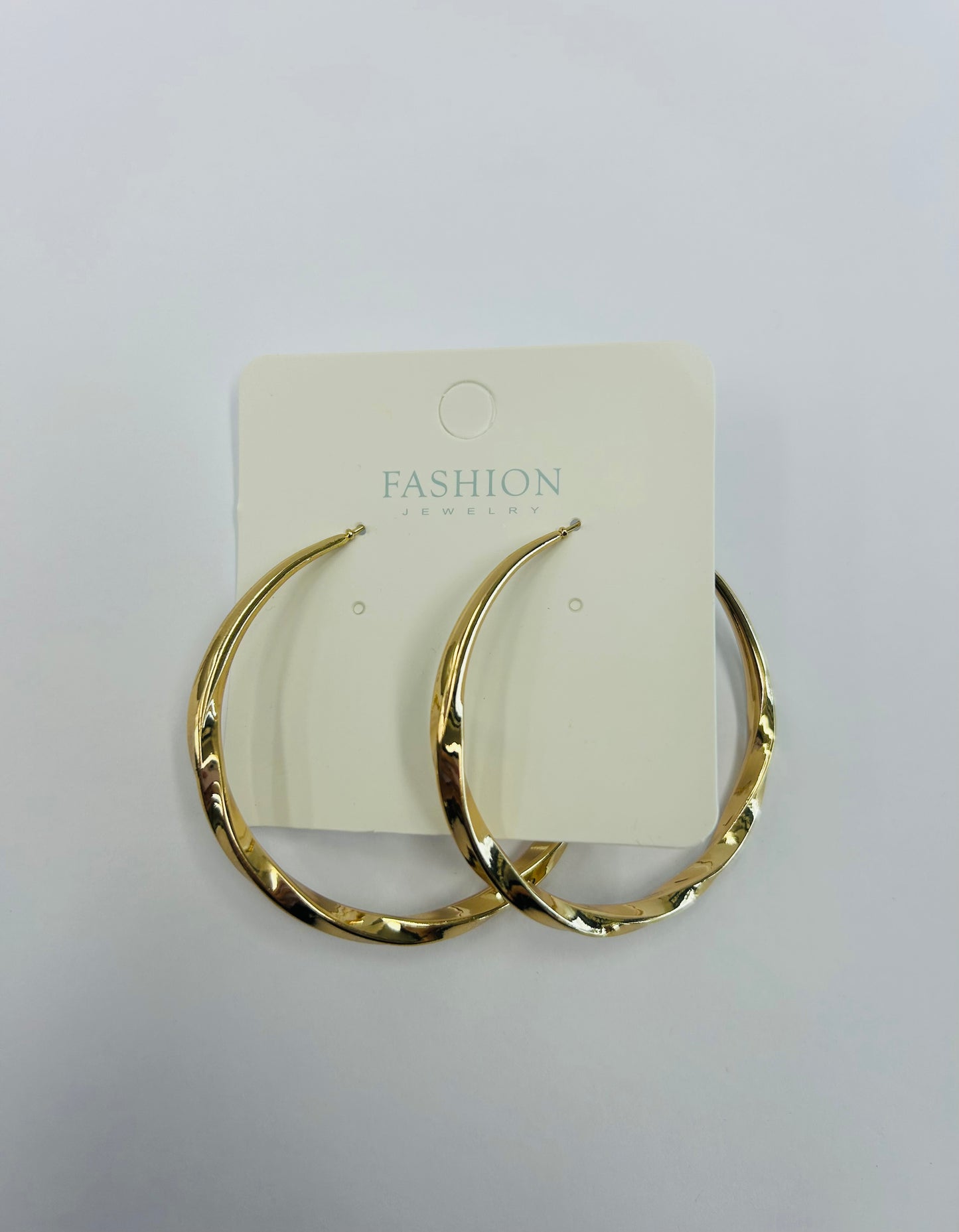 Gold tone hoop earrings