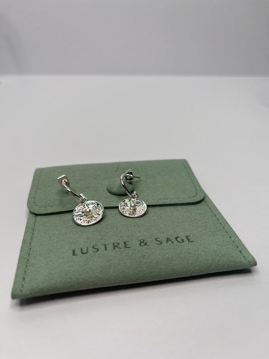 Silver tone earrings