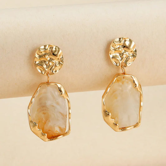 GOLD & WHITE GEOMETRIC DROP EARRINGS.